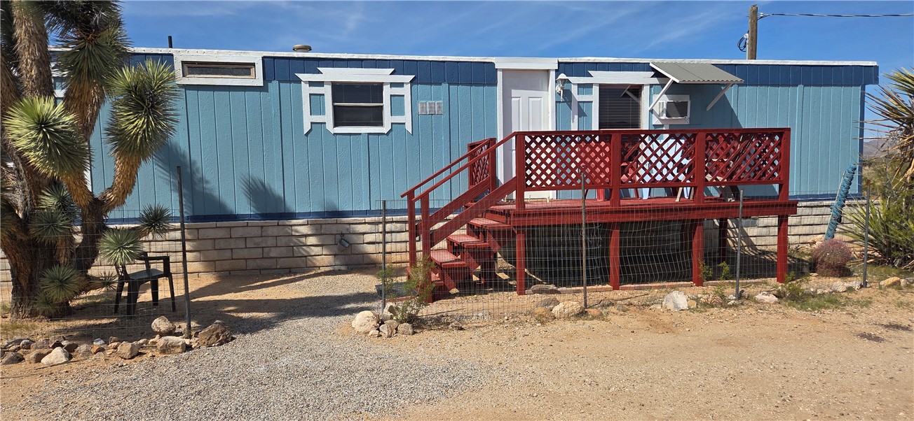 5397 Cordes Road Golden Valley, AZ 86413 - Photo 29 of 50 a view of a house with a yard