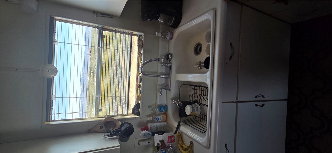 5397 Cordes Road Golden Valley, AZ 86413 - Photo 8 of 50 a close view of sink and stove