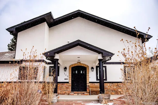 a view of a building with a street