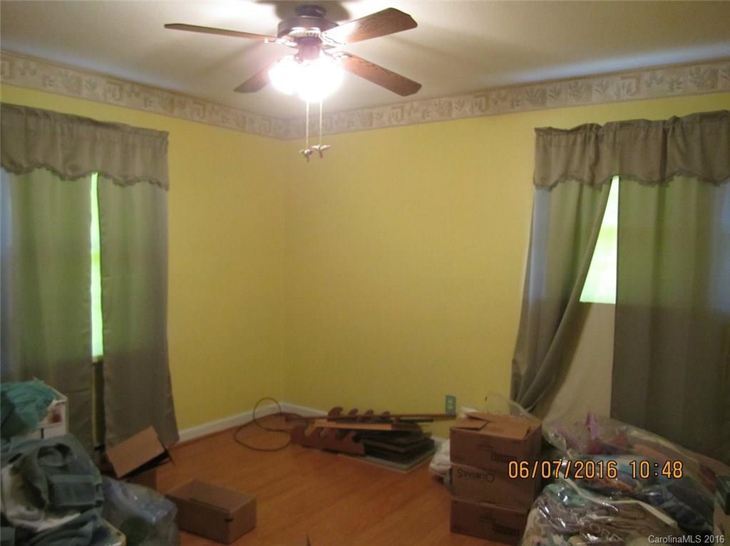 1445 Wetmore Road Woodleaf, NC 27054 - Photo 8 of 14 a room with a window