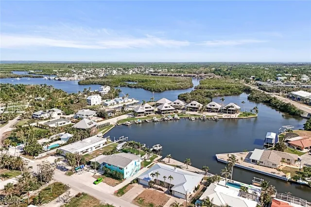 an aerial view of a house with outdoor space