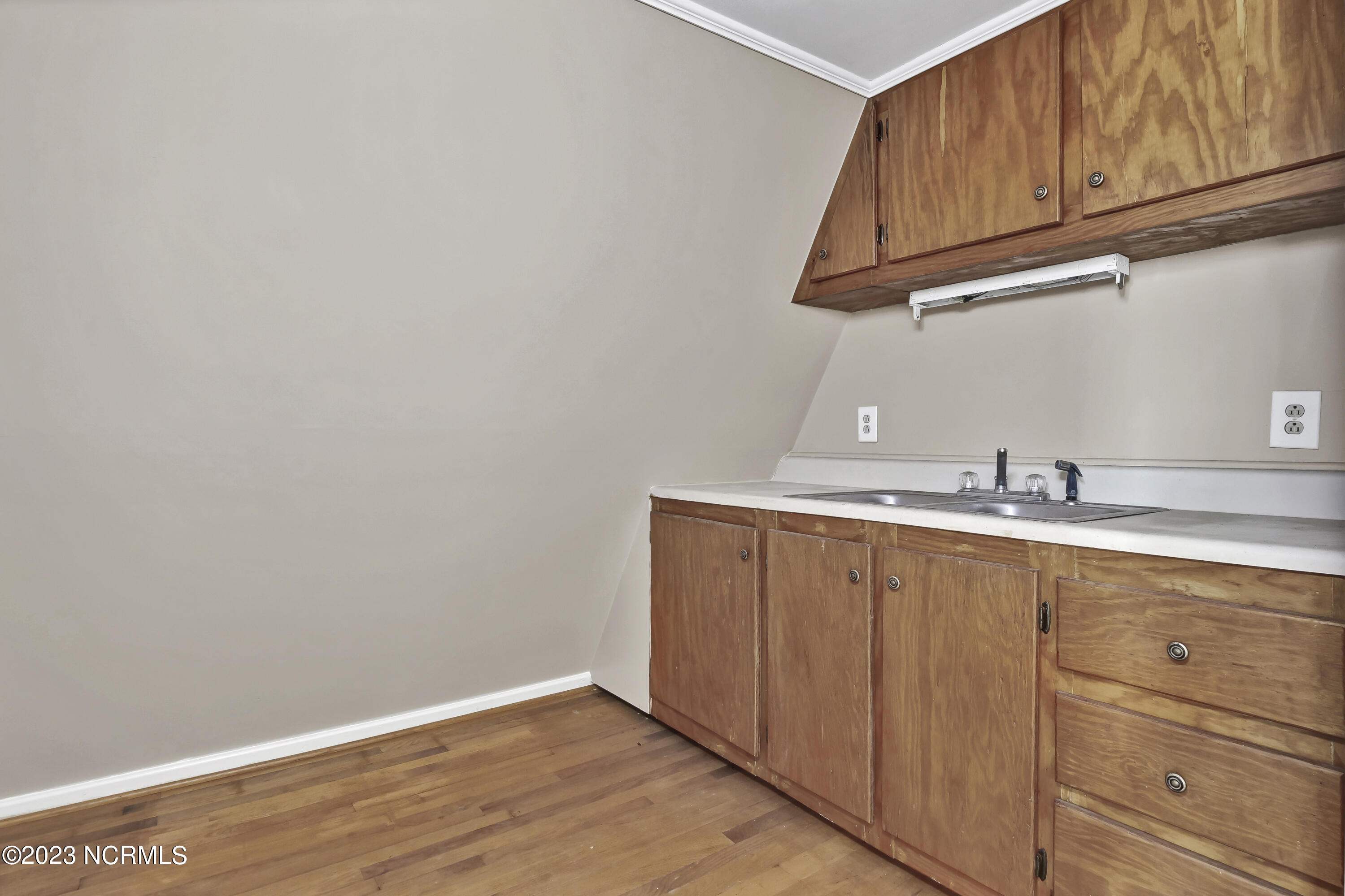 6 Scotts Hill Loop Road Wilmington, NC 28411 - Photo 30 of 40 kitchen above garage