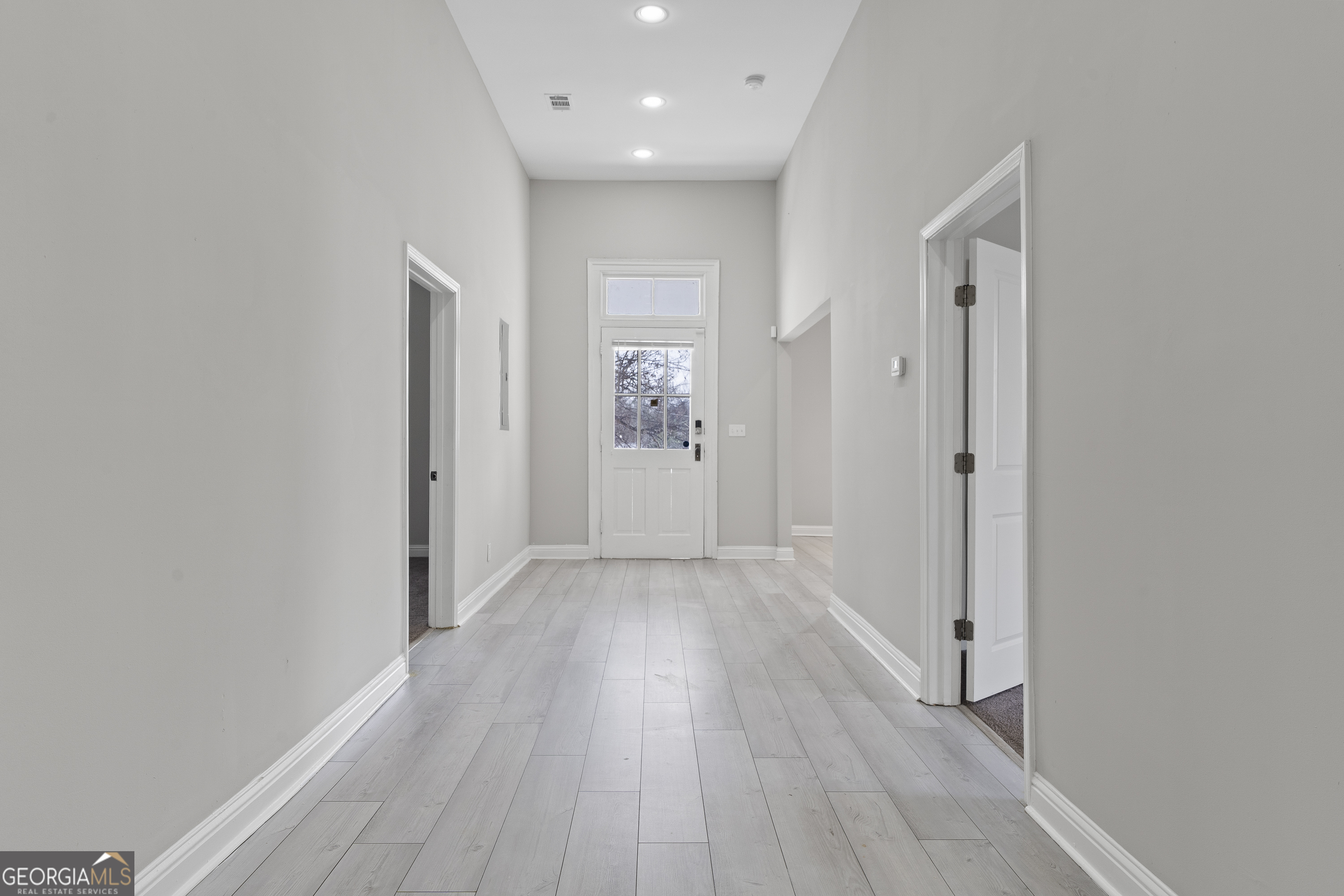 1471 Jackson Street Macon, GA 31201 - Photo 6 of 30 a view of a hallway with wooden floor