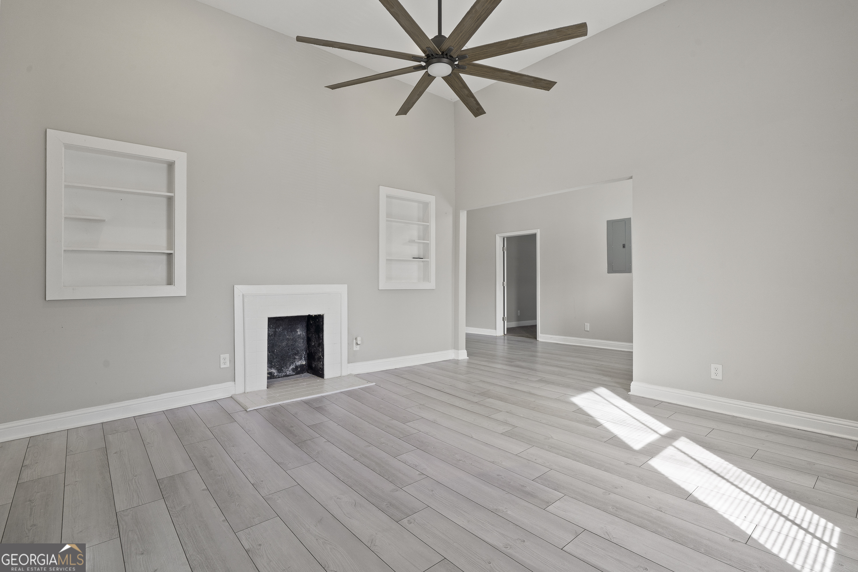 1471 Jackson Street Macon, GA 31201 - Photo 7 of 30 a view of empty room with wooden floor and fan