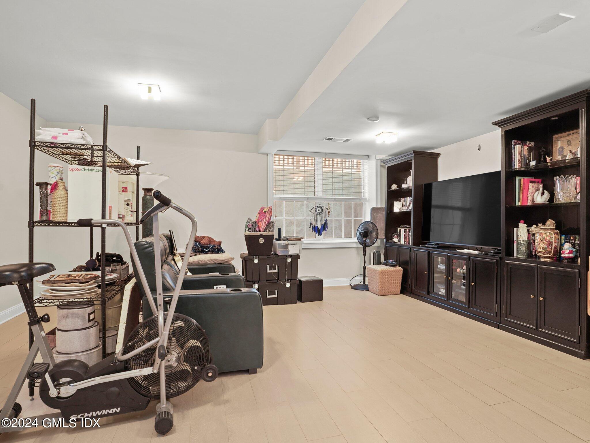 32 Cliff Avenue, Unit 3 Greenwich, CT 06830 - Photo 17 of 23 a view of a room with gym equipment