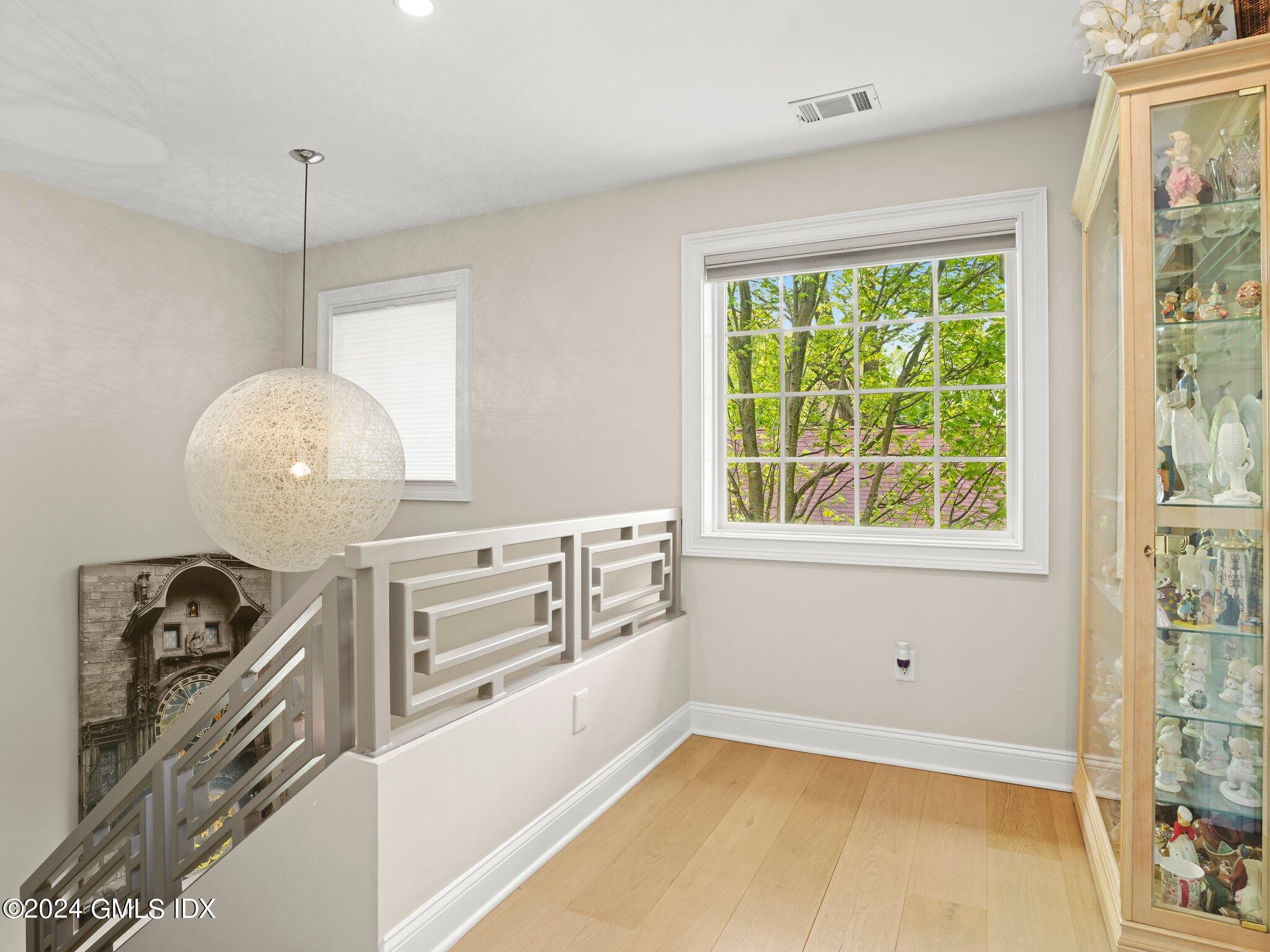 32 Cliff Avenue, Unit 3 Greenwich, CT 06830 - Photo 10 of 23 a kitchen with a stove a sink and a window