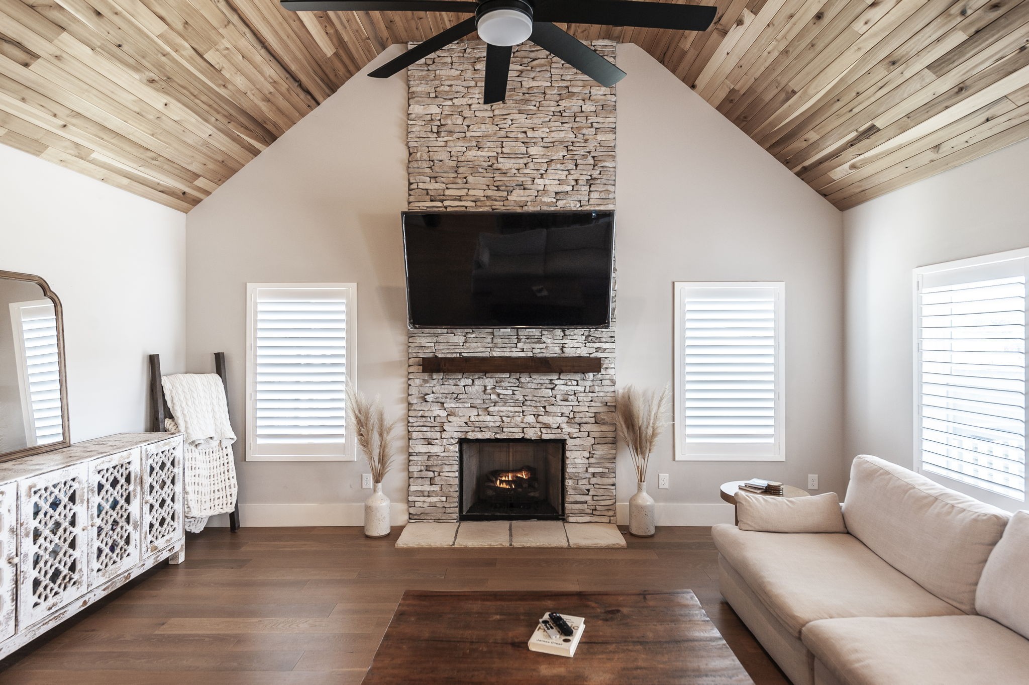 1160 Hearn Hill Road Watertown, TN 37184 - Photo 13 of 91 a living room with furniture a flat screen tv and a fireplace
