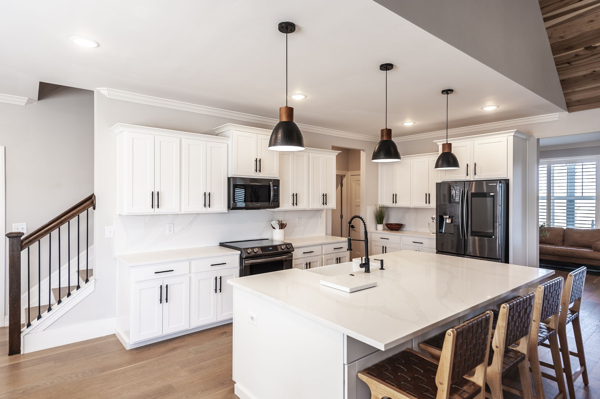 1160 Hearn Hill Road Watertown, TN 37184 - Photo 22 of 91 a kitchen with stainless steel appliances kitchen island a table chairs and a refrigerator