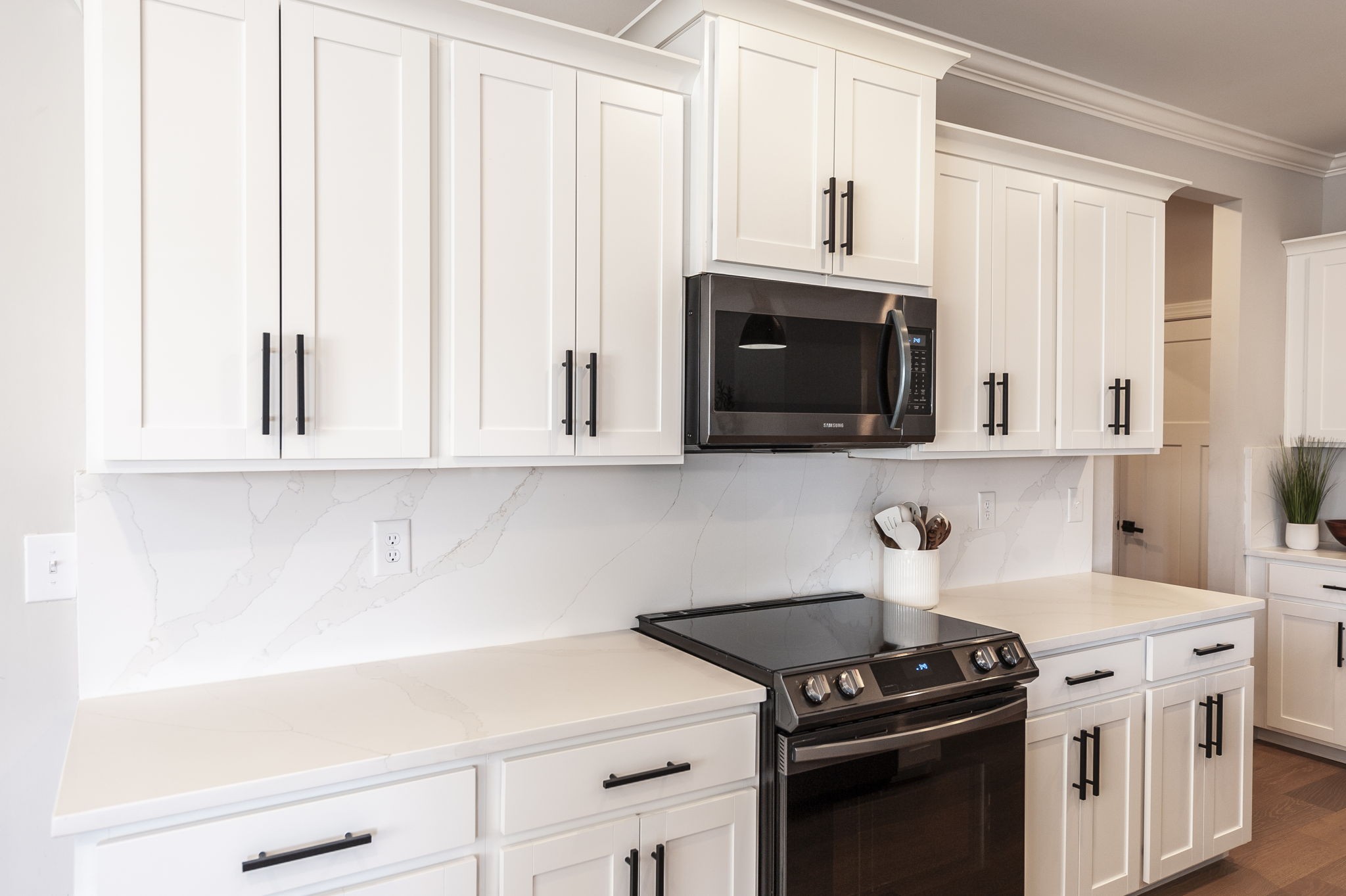 1160 Hearn Hill Road Watertown, TN 37184 - Photo 24 of 91 a kitchen with stainless steel appliances a stove a microwave and cabinets