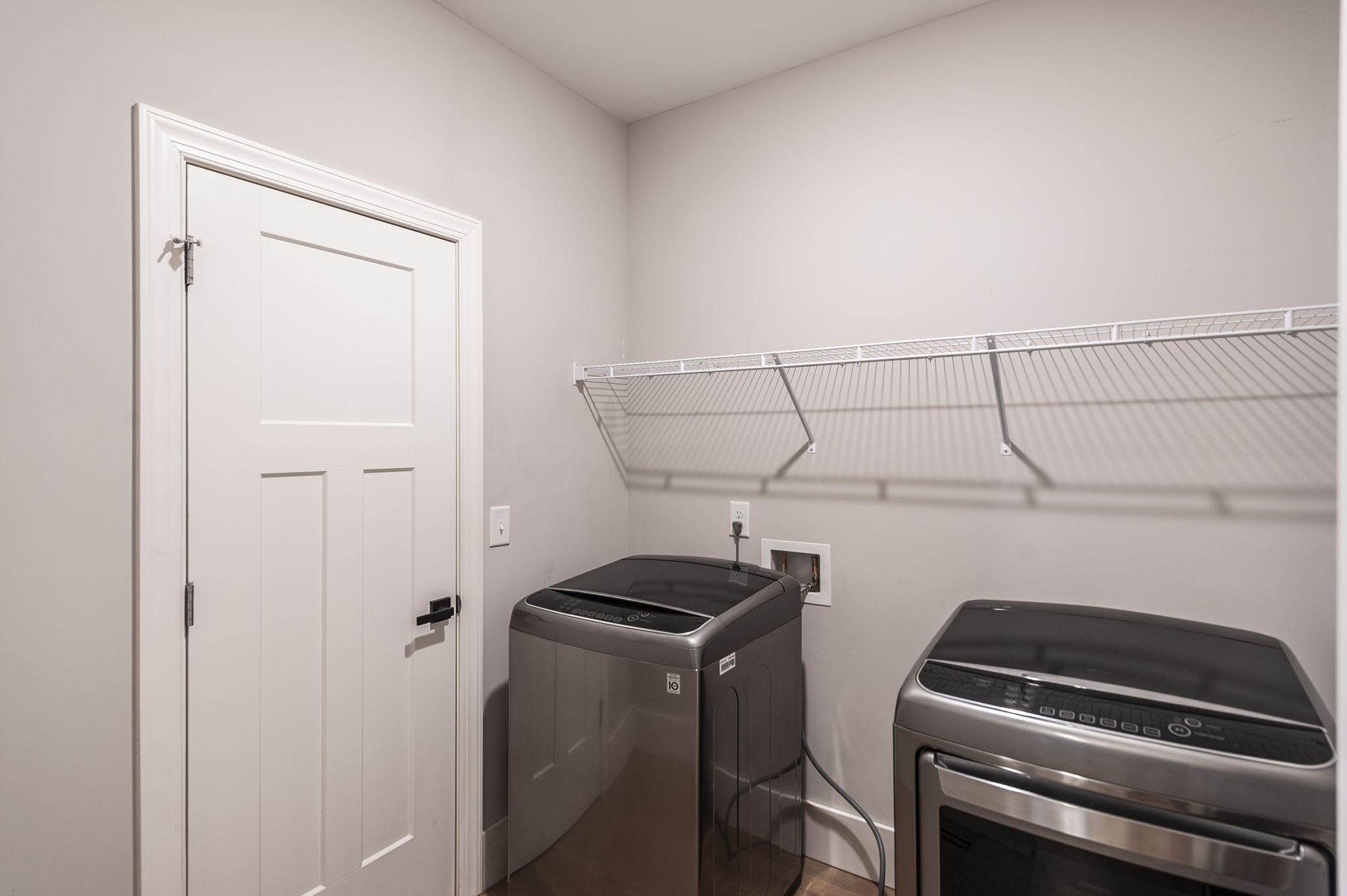 1160 Hearn Hill Road Watertown, TN 37184 - Photo 31 of 91 a view of storage and utility room with racks on the wall
