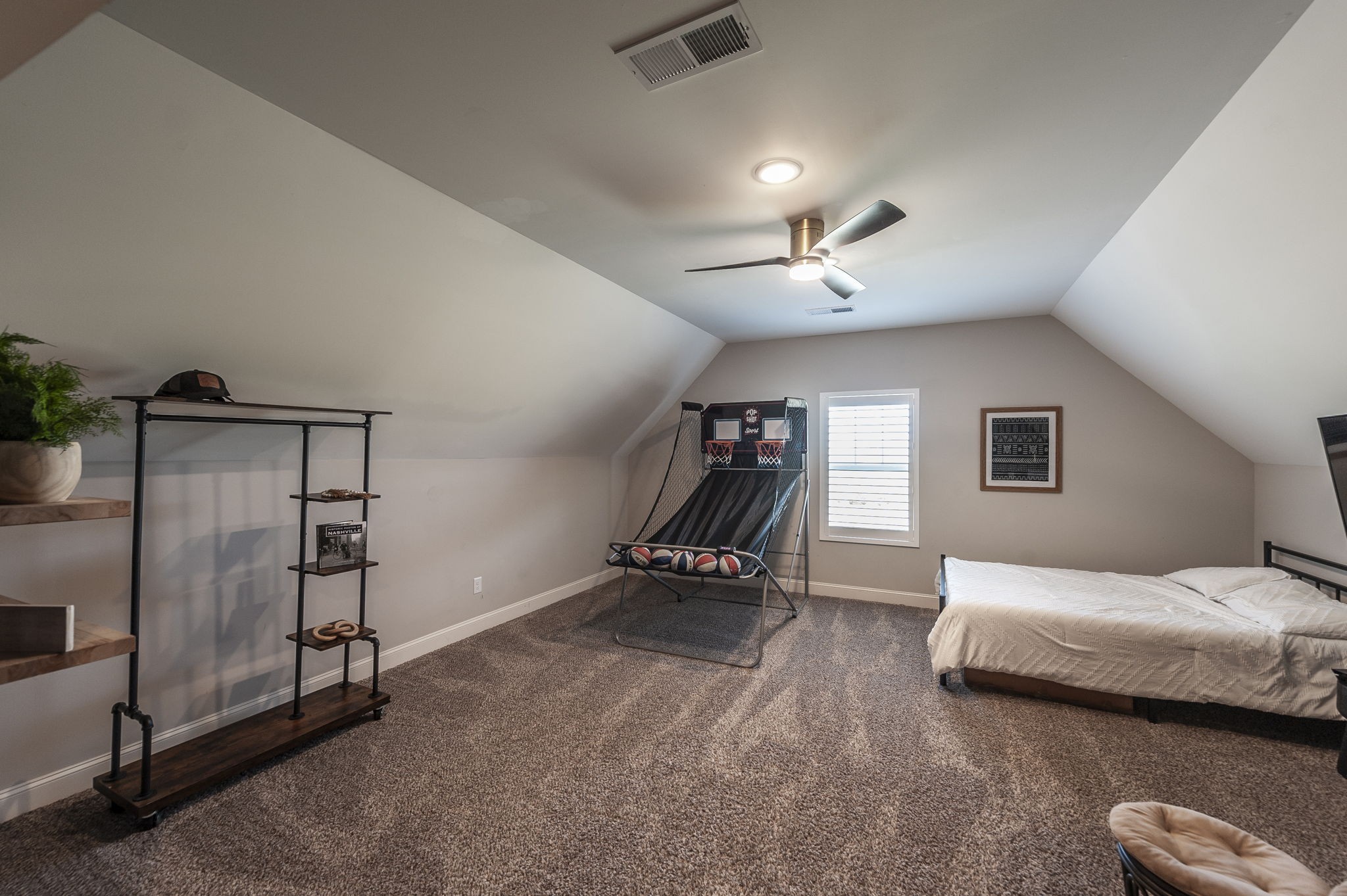 1160 Hearn Hill Road Watertown, TN 37184 - Photo 47 of 91 a bedroom with a bed and a chandelier