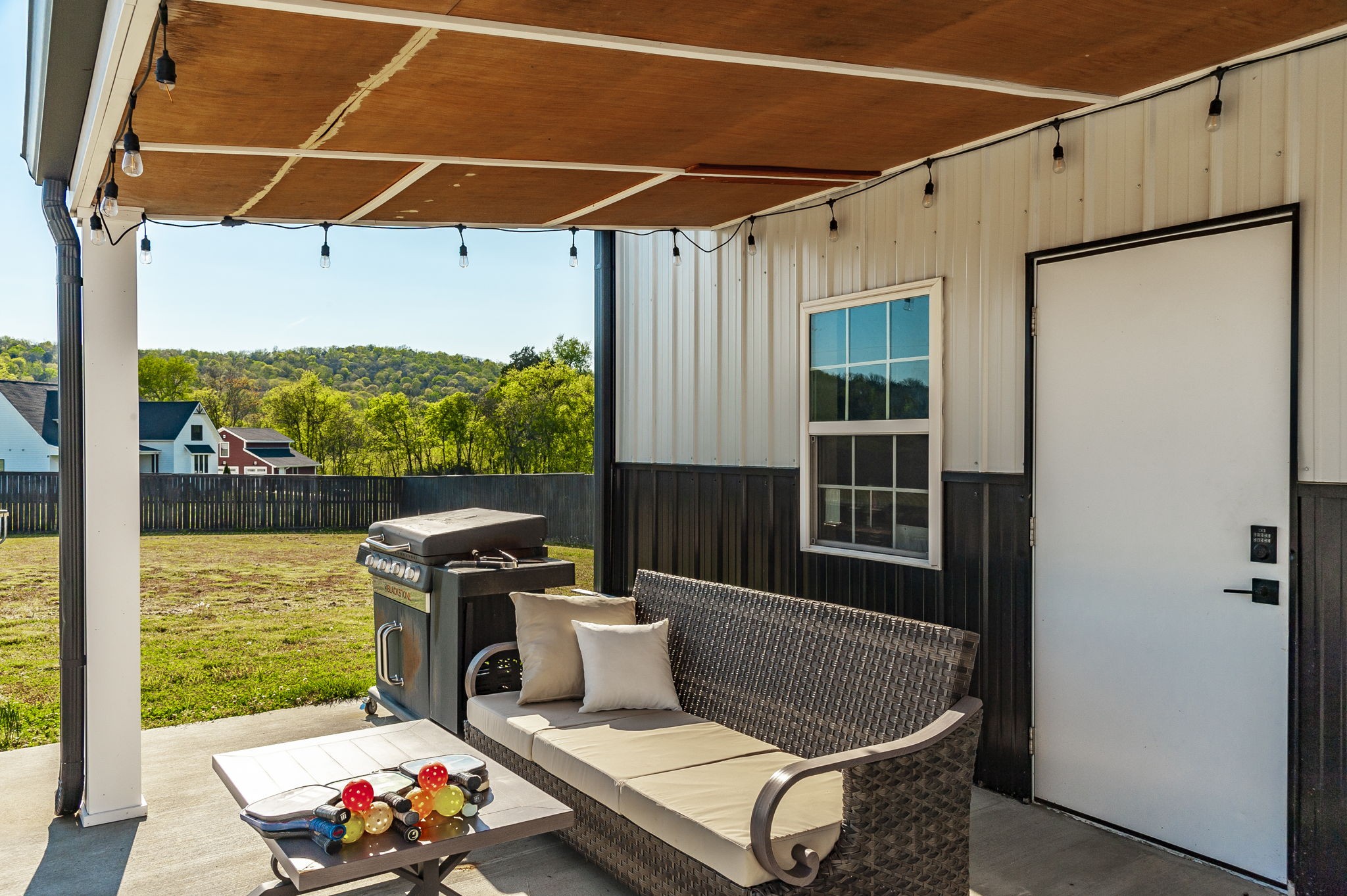 1160 Hearn Hill Road Watertown, TN 37184 - Photo 66 of 91 a view of a patio with a table chairs and a potted plant