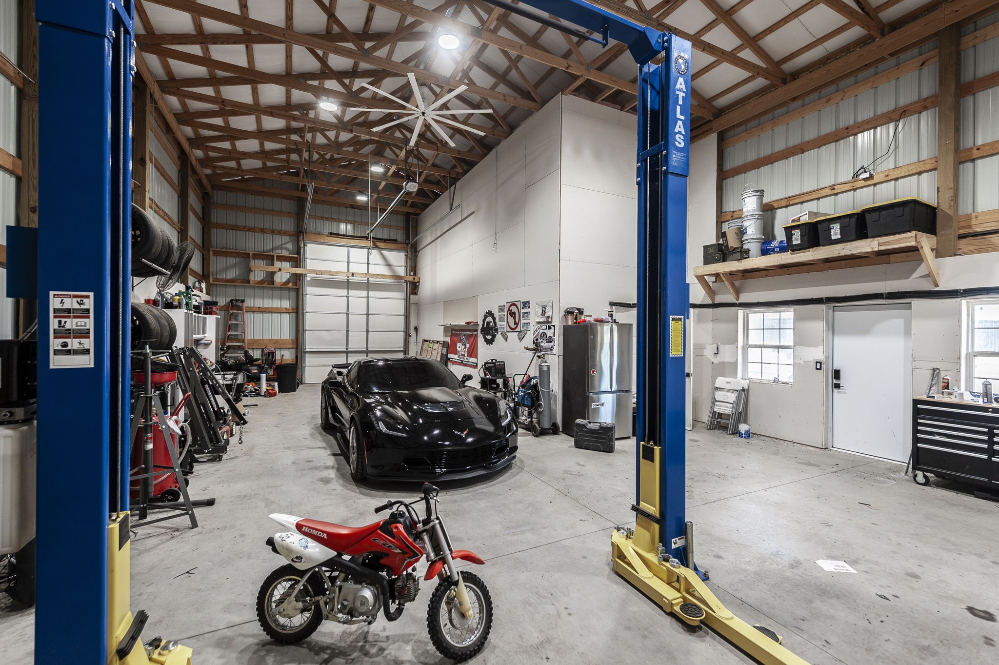 1160 Hearn Hill Road Watertown, TN 37184 - Photo 82 of 91 a view of a storage room with gym equipment
