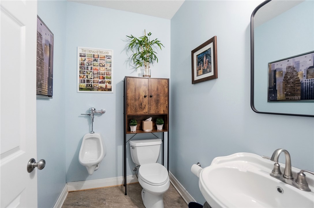 472 Timber Walk Court Springboro, OH 45066 - Photo 47 of 86 This lower level powder room features a urinal.