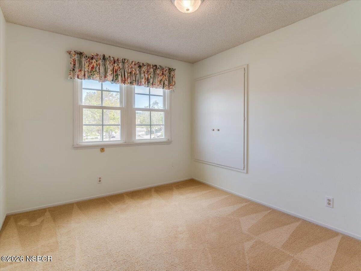 360 Tallyho Road Santa Maria, CA 93455 - Photo 34 of 72 an empty room with a window