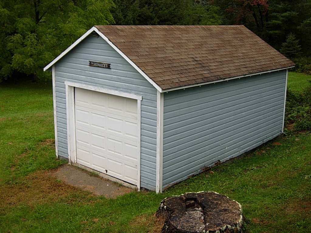 190 Cross Road Clarksburg, MA 01247 - Photo 2 of 12 a view of a small house and garage