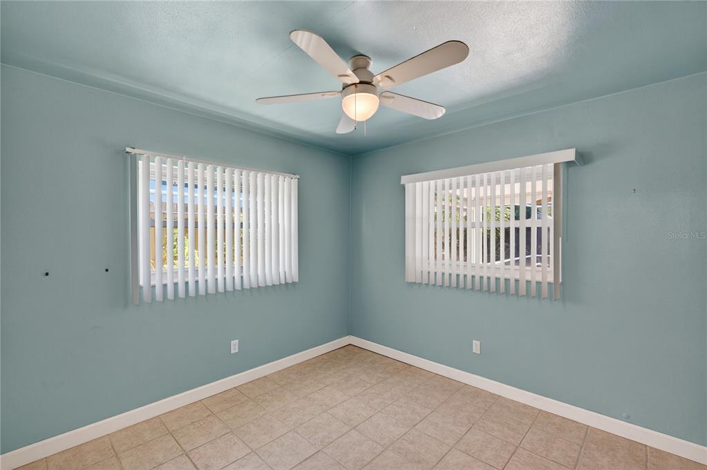 1417 Spring Lane Clearwater, FL 33755 - Photo 14 of 29 a view of an empty room with a window