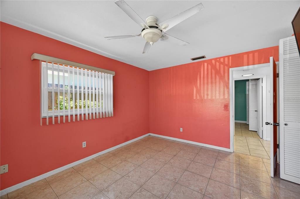 1417 Spring Lane Clearwater, FL 33755 - Photo 20 of 28 a view of an empty room with a window