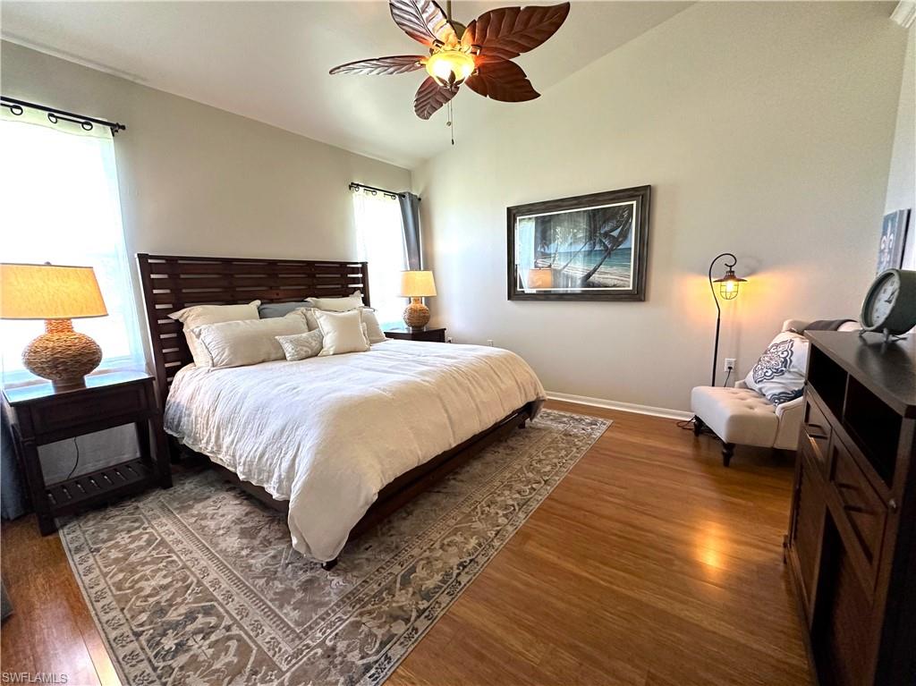 1965 Crestview Way, Unit 156 Naples, FL 34119 - Photo 27 of 45 a bedroom with bed and a window