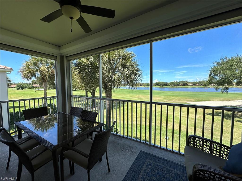 1965 Crestview Way, Unit 156 Naples, FL 34119 - Photo 3 of 45 a view of a porch with furniture and wooden floor