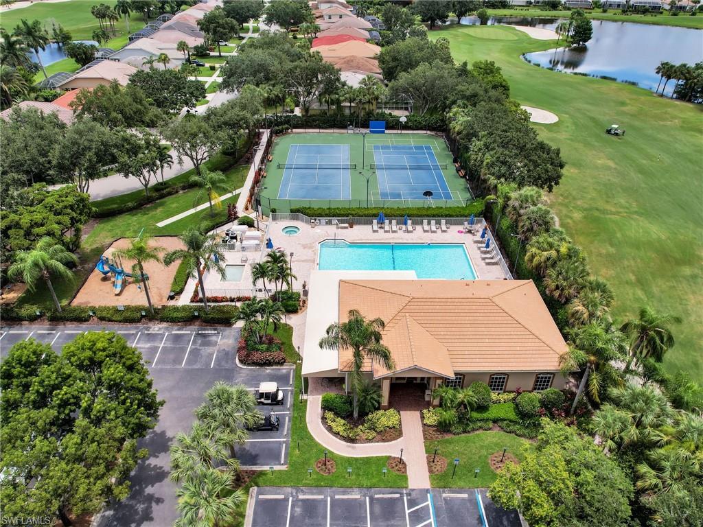 1965 Crestview Way, Unit 156 Naples, FL 34119 - Photo 40 of 45 an aerial view of a house with yard swimming pool and outdoor seating