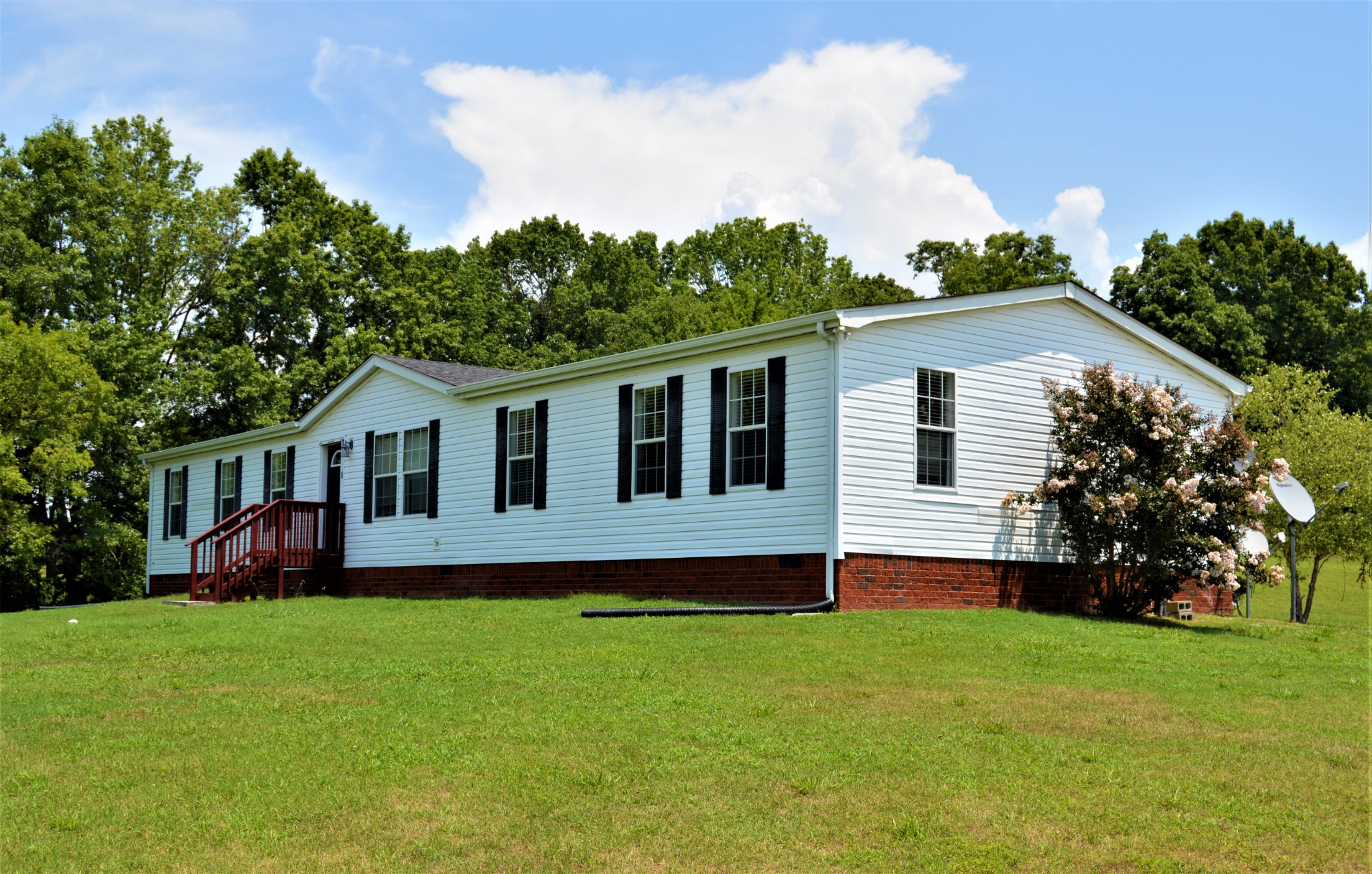545 East Robertson Road Castalian Springs, TN 37031 - Photo 1 of 19 a front view of house with yard and green space