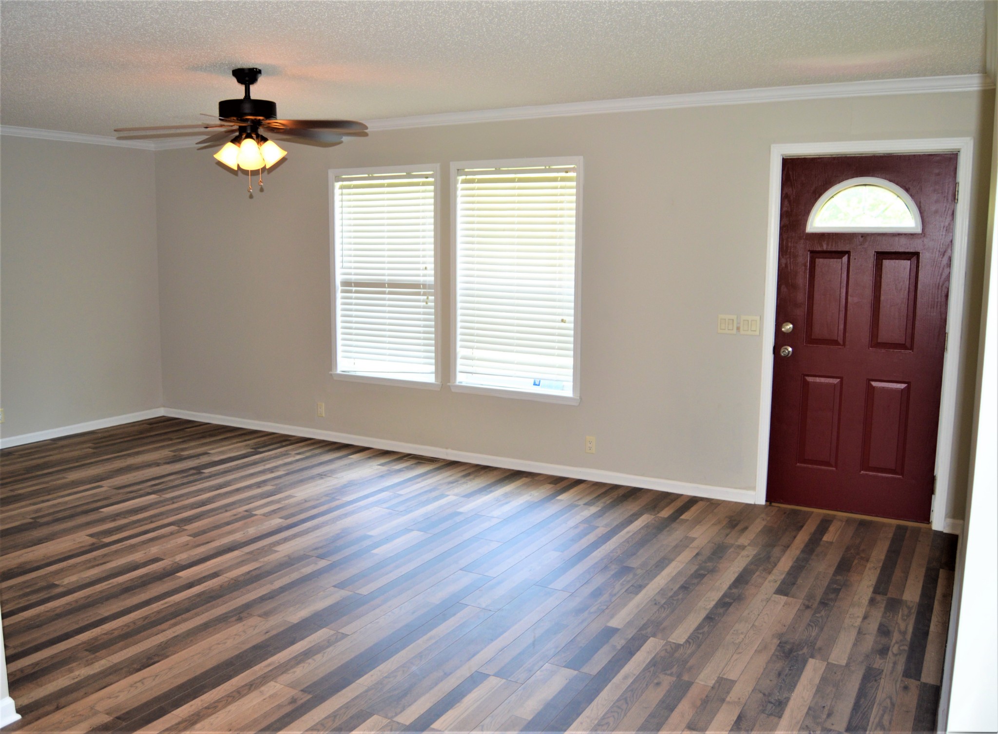 545 East Robertson Road Castalian Springs, TN 37031 - Photo 12 of 19 a view of empty room with wooden floor and window