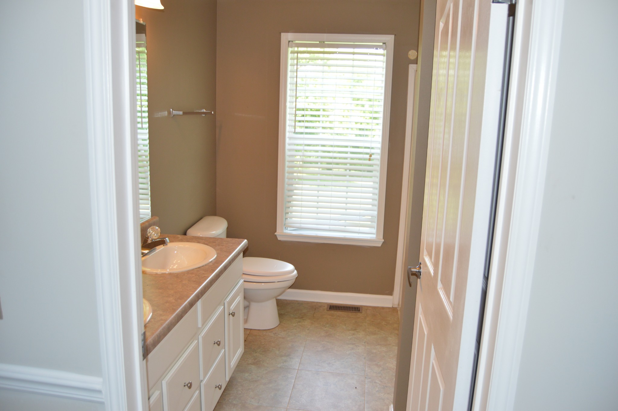 545 East Robertson Road Castalian Springs, TN 37031 - Photo 14 of 19 a bathroom with a sink a toilet and tub