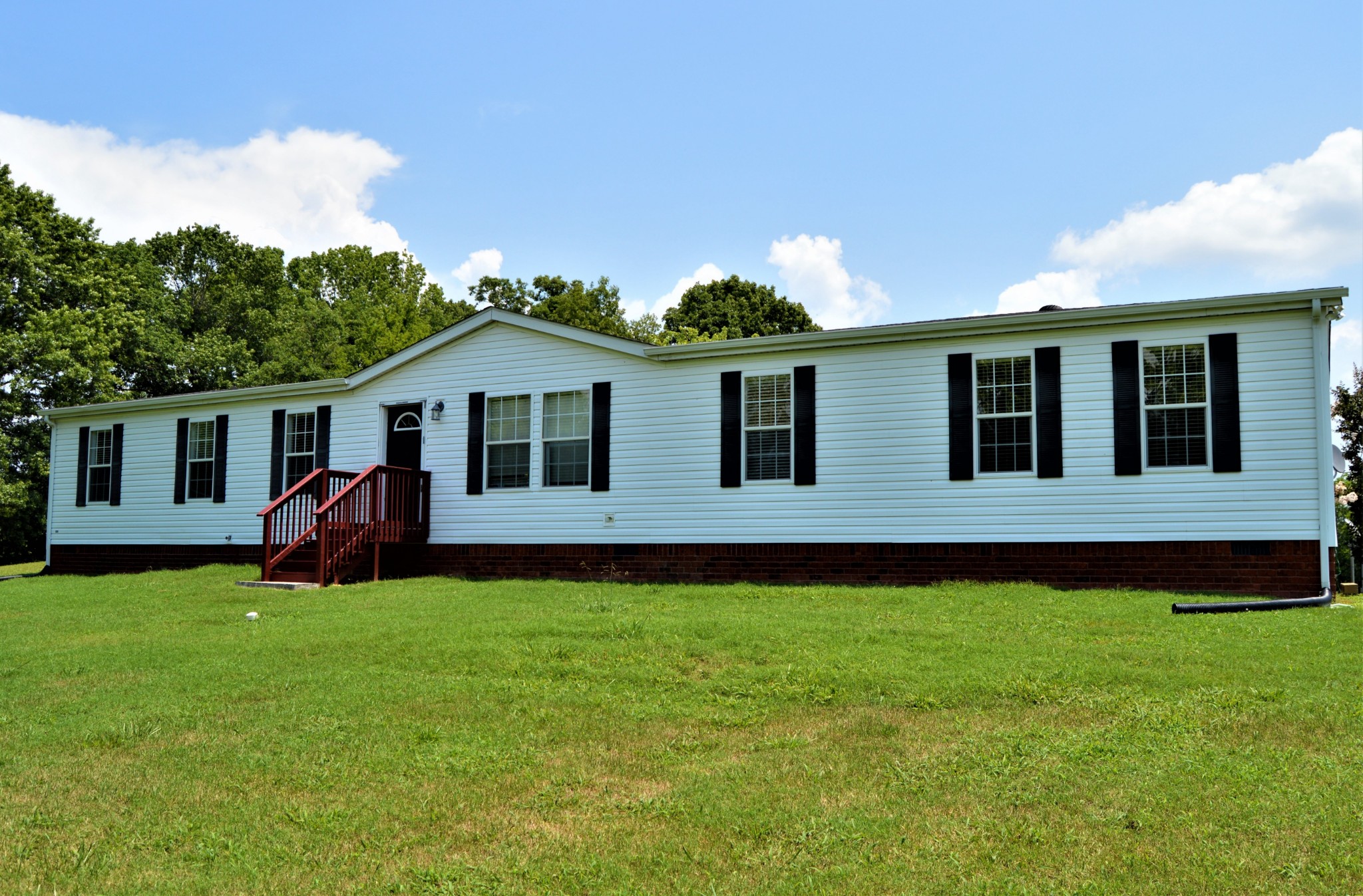 545 East Robertson Road Castalian Springs, TN 37031 - Photo 2 of 19 a view of a house with a yard and sitting area