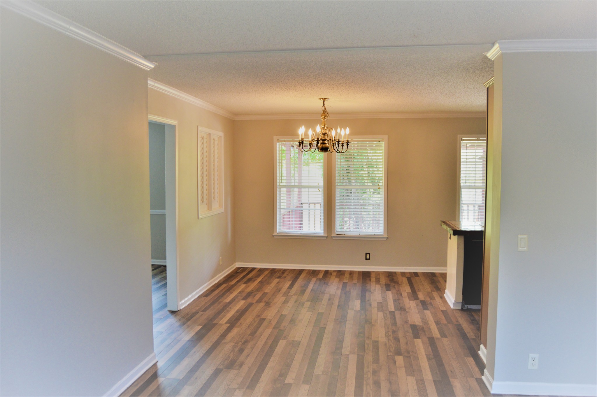 545 East Robertson Road Castalian Springs, TN 37031 - Photo 8 of 19 a view of empty room with wooden floor and fan
