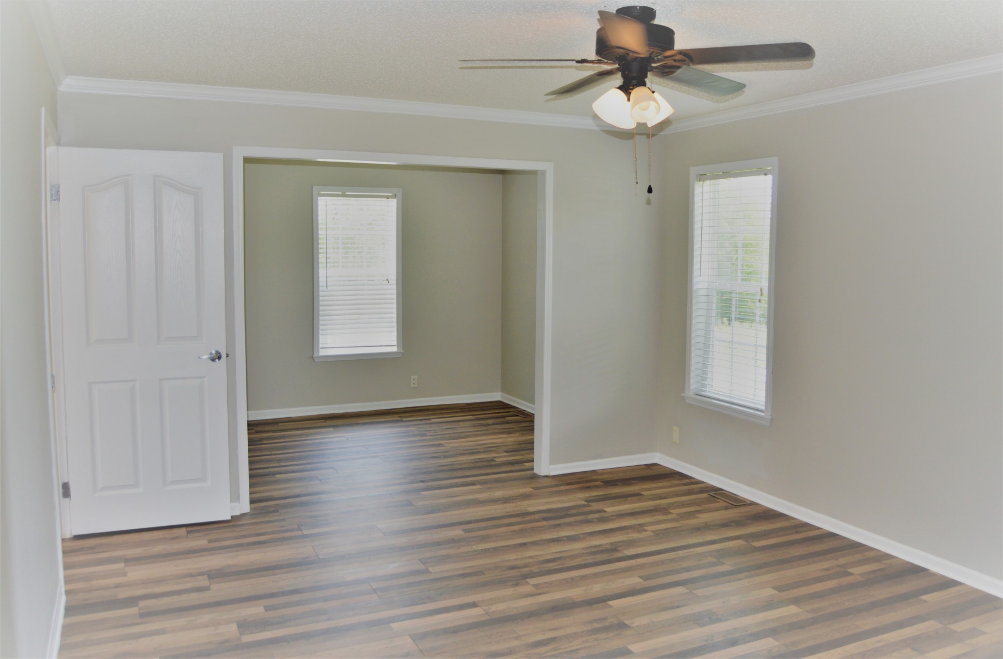 545 East Robertson Road Castalian Springs, TN 37031 - Photo 9 of 19 a view of an empty room with window and wooden floor