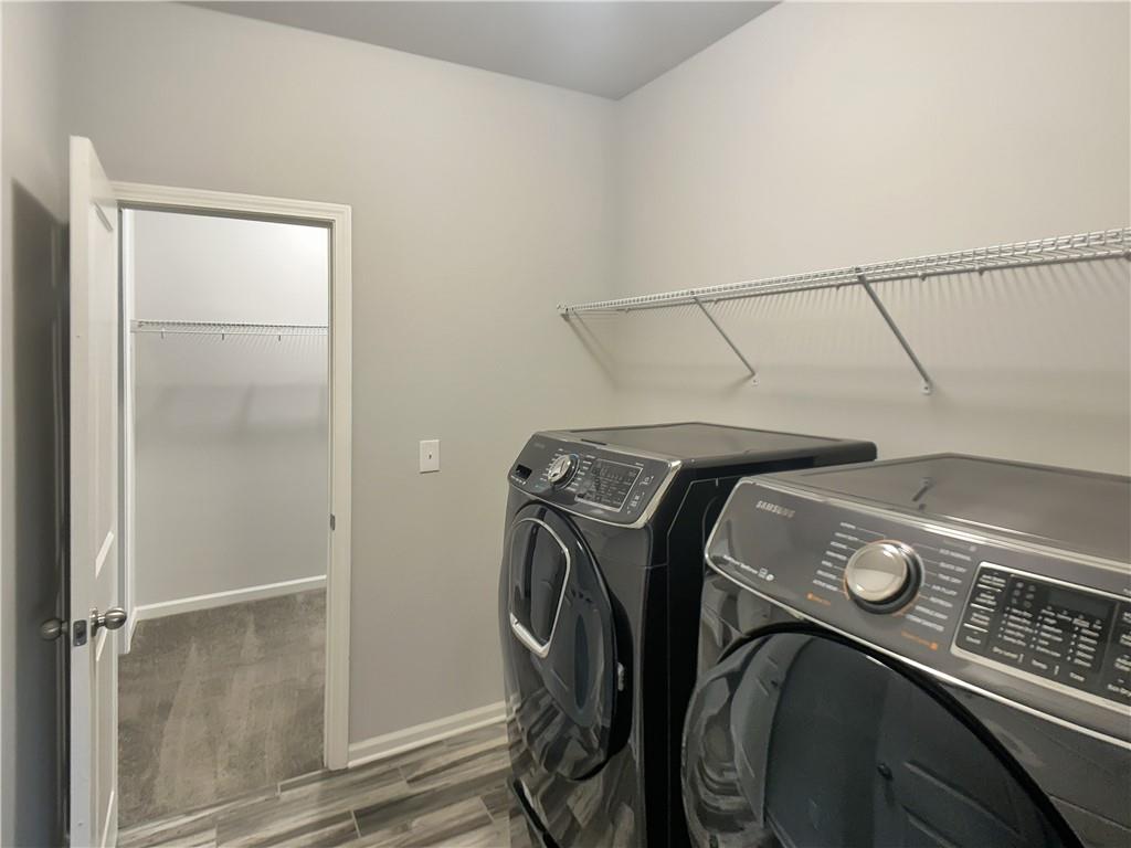908 West Union Grove Circle Auburn, GA 30011 - Photo 14 of 16 a utility room with dryer and washer