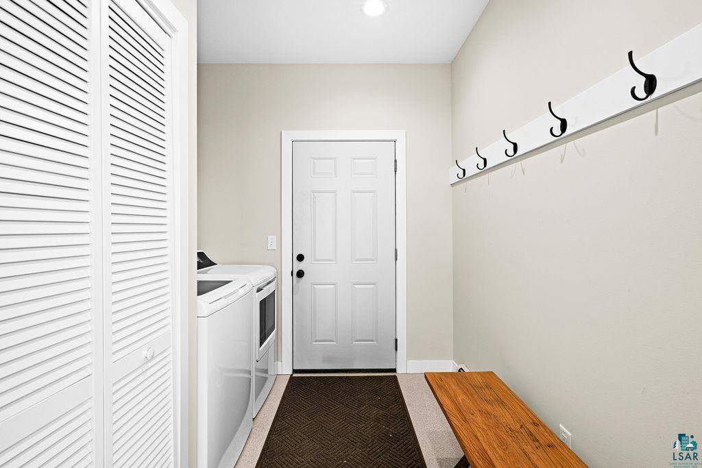 2236 Hoover Street Duluth, MN 55811 - Photo 37 of 52 Laundry room featuring washer and dryer and baseboards