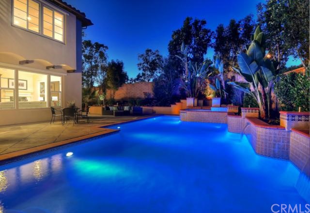 2 Roshelle Lane Ladera Ranch, CA 92694 - Photo 1 of 1 The secluded backyard features an oversized pool, spa, water features, covered patio, built in barbecue and refrigerator.