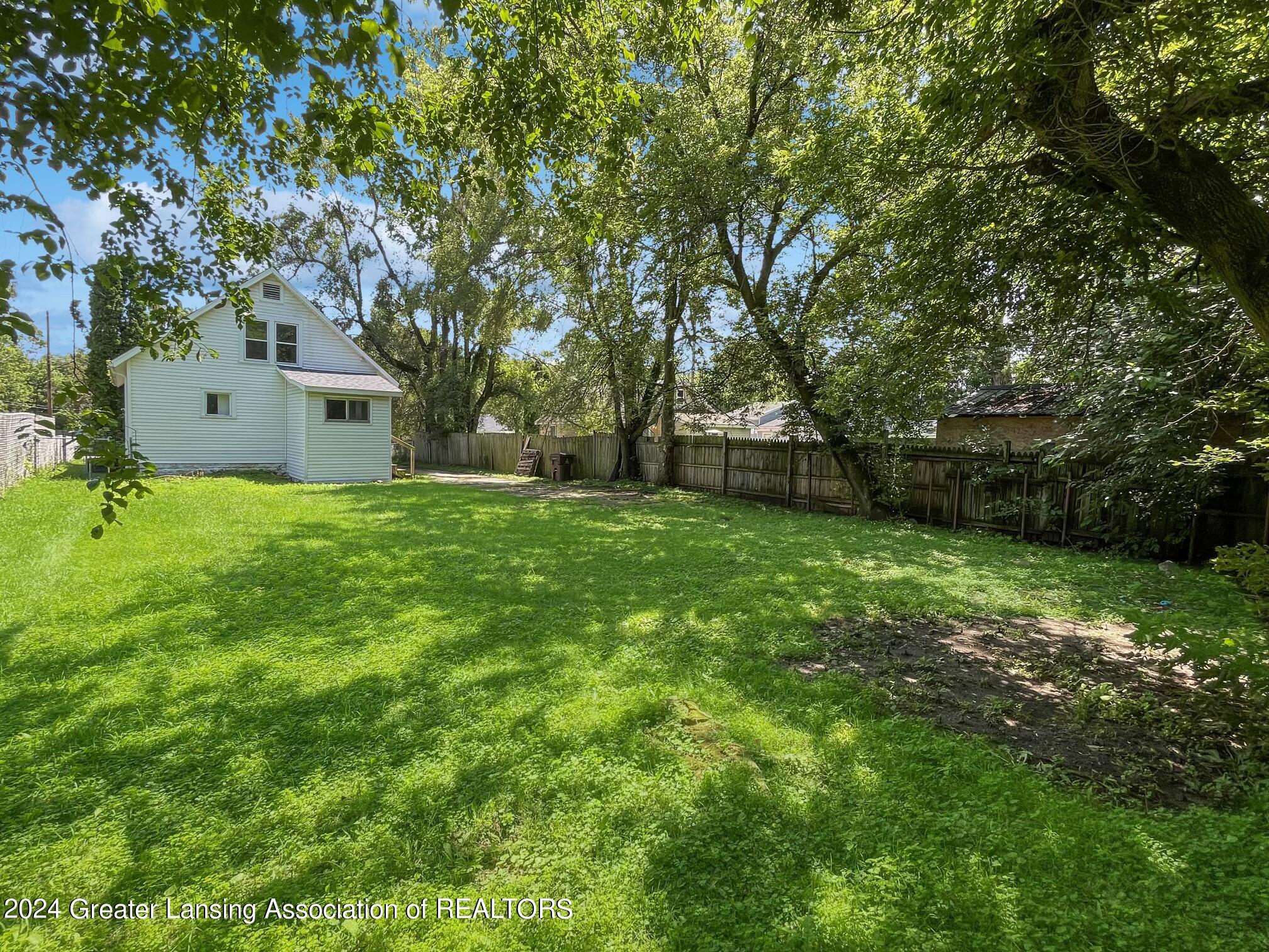 4918 Pleasant Grove Road Lansing, MI 48910 - Photo 4 of 12 9bc7c183cb6b8e41a5e57adc62ea06340f1ce745