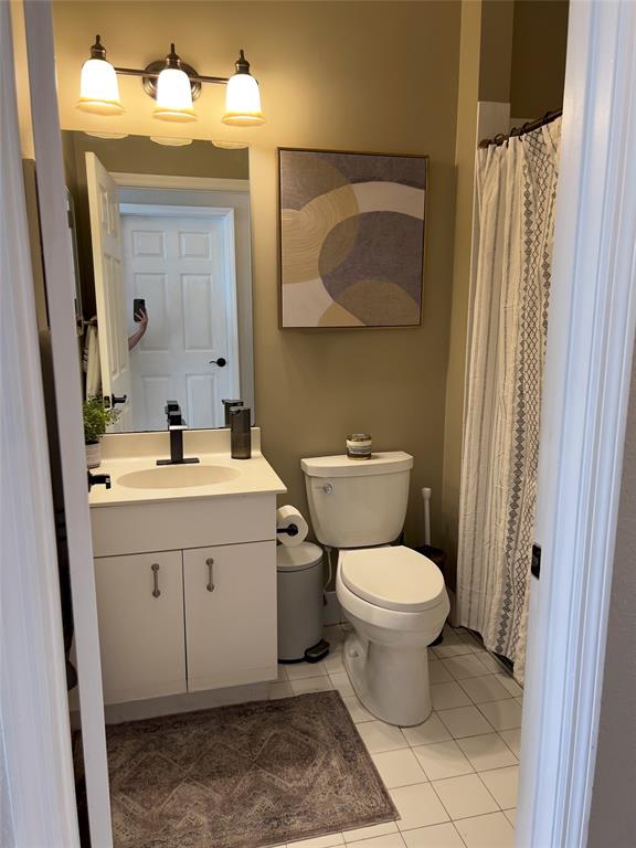 1423 Southwest 158th Avenue Pembroke Pines, FL 33027 - Photo 13 of 43 a bathroom with a toilet sink and mirror