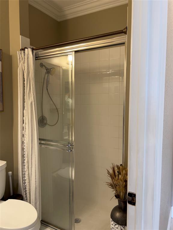 1423 Southwest 158th Avenue Pembroke Pines, FL 33027 - Photo 14 of 43 a bathroom with a shower and toilet