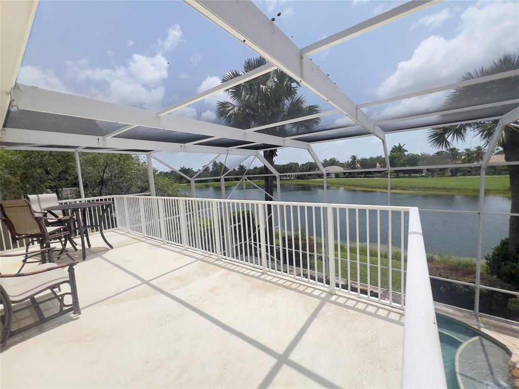 1423 Southwest 158th Avenue Pembroke Pines, FL 33027 - Photo 19 of 43 a balcony with furniture