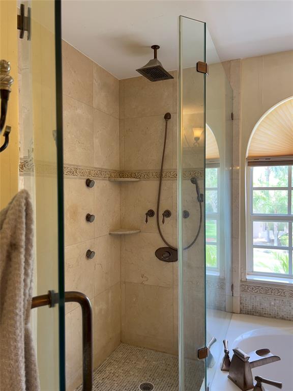 1423 Southwest 158th Avenue Pembroke Pines, FL 33027 - Photo 23 of 43 a bathroom with a shower and a mirror