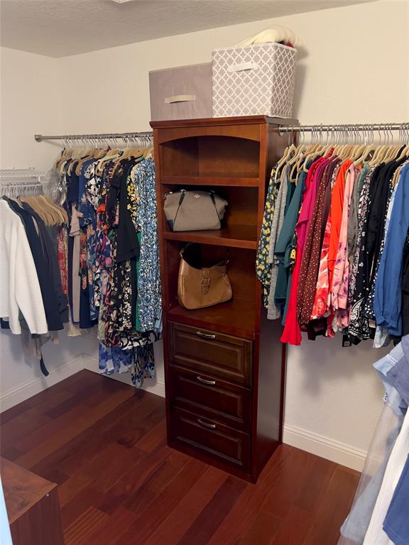 1423 Southwest 158th Avenue Pembroke Pines, FL 33027 - Photo 25 of 43 a view of walk in closet with clothes