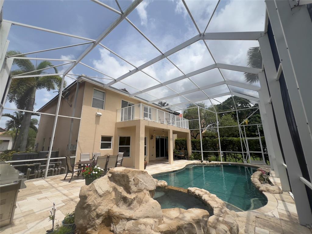 1423 Southwest 158th Avenue Pembroke Pines, FL 33027 - Photo 43 of 43 a view of a house with a yard