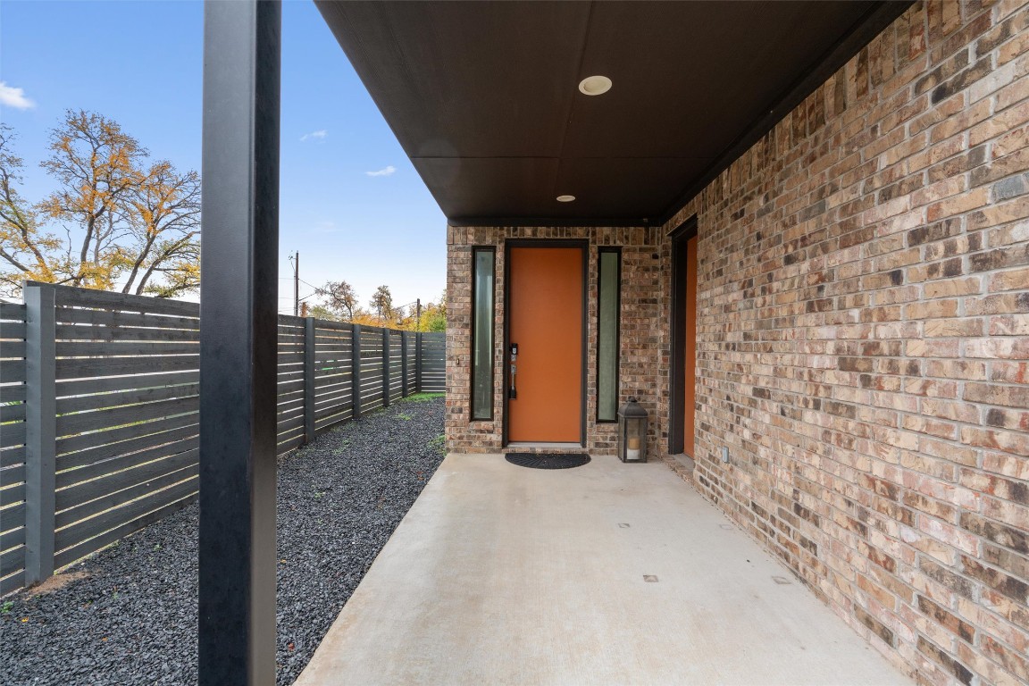 5002 Pecan Springs Road, Unit 1 Austin, TX 78723 - Photo 4 of 38 Fenced backyard with a patio area