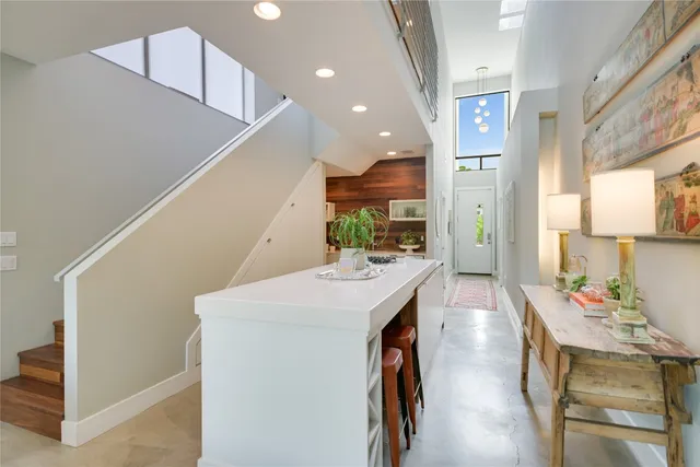 a view of kitchen with furniture and wooden floor