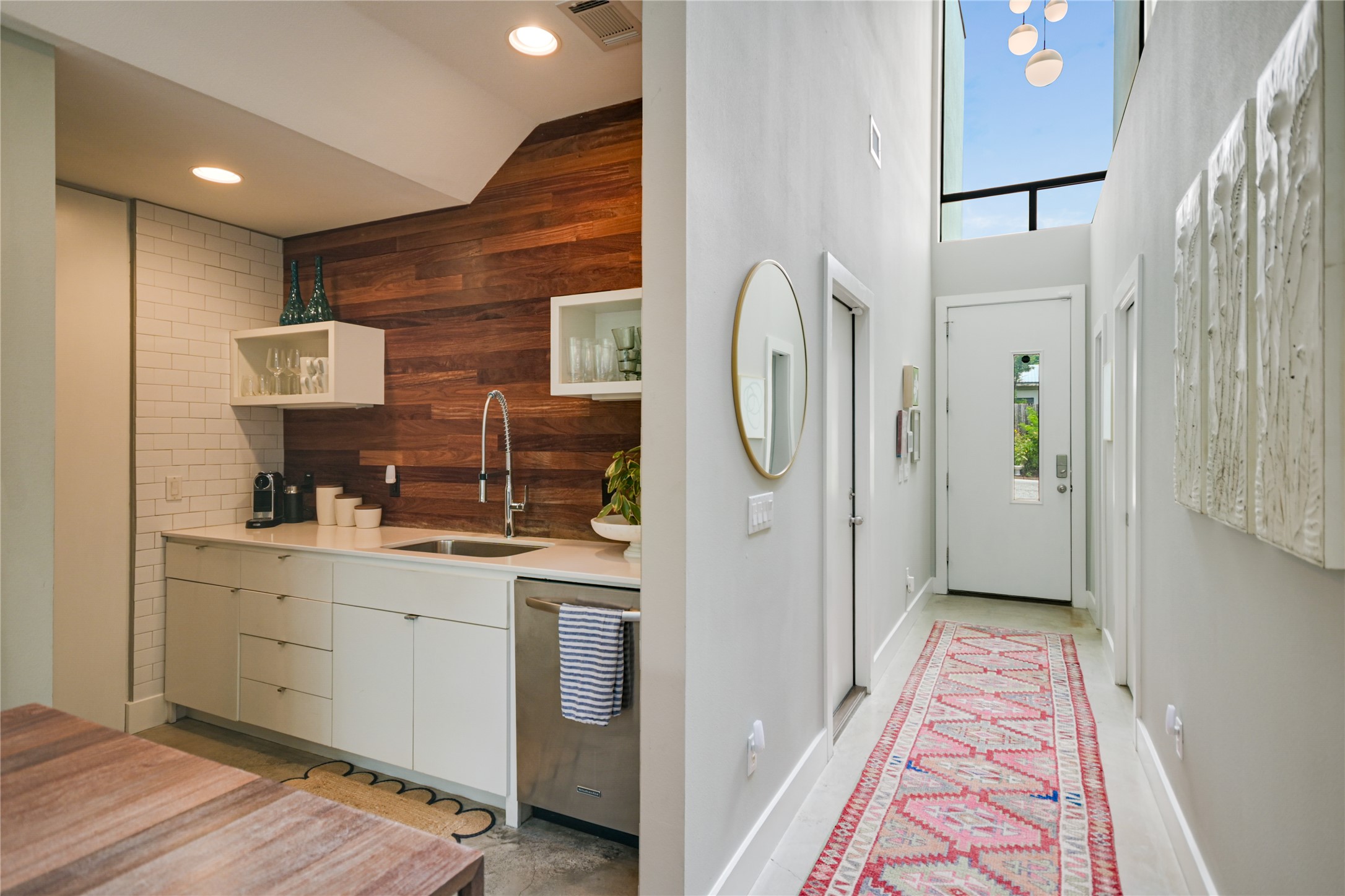 1715 Giles Street, Unit A Austin, TX 78722 - Photo 12 of 24 Adding an organic element, Brazilian cherry accents are found throughout the main floor.