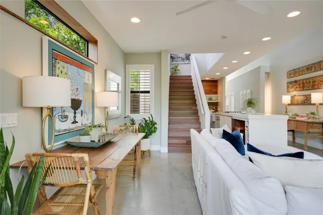 a living room with furniture and a table