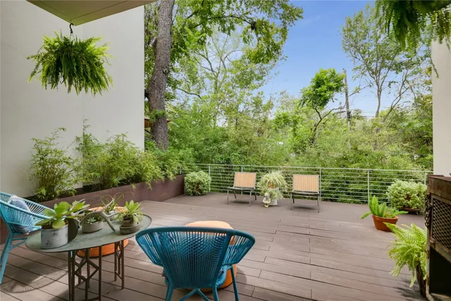 a view of outdoor sitting area with furniture