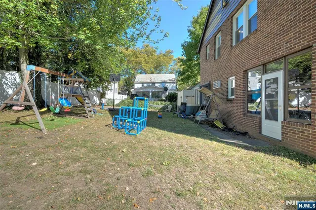 a view of a house with a park