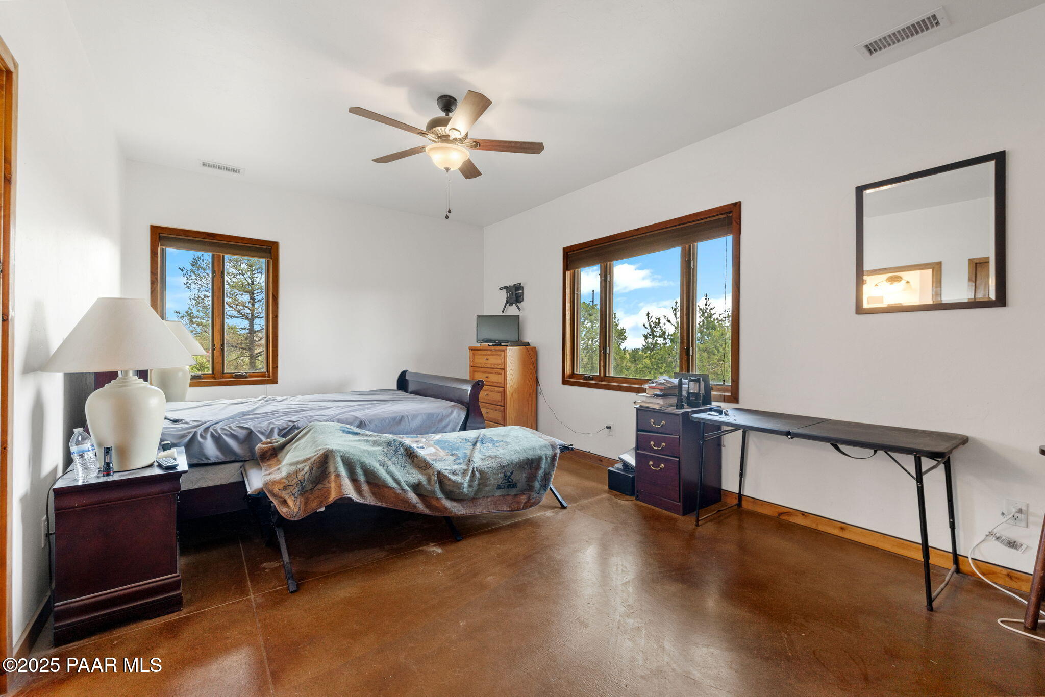 13225 North Bull Run Road Prescott, AZ 86305 - Photo 71 of 76 a bedroom with a bed and wooden floor