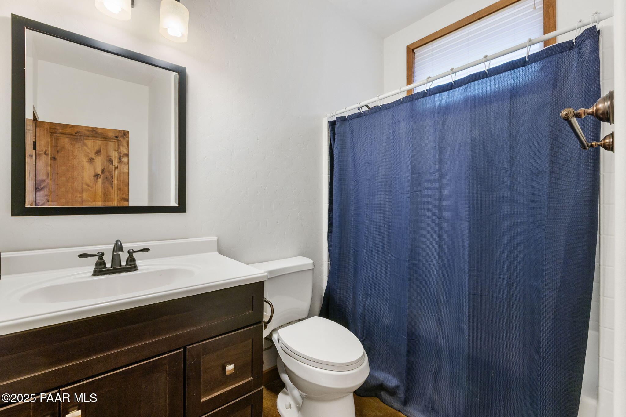 13225 North Bull Run Road Prescott, AZ 86305 - Photo 74 of 76 a bathroom with a sink toilet and vanity