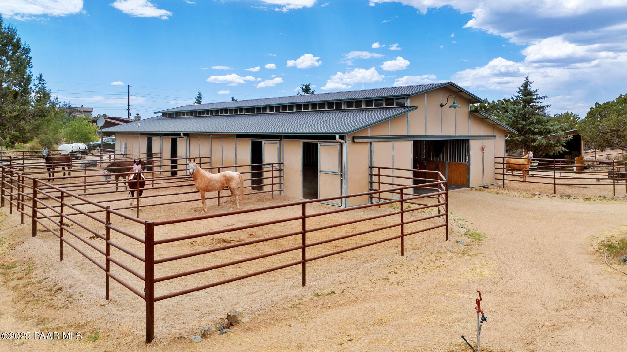 13225 North Bull Run Road Prescott, AZ 86305 - Photo 8 of 76 a view of a patio with a table and chairs